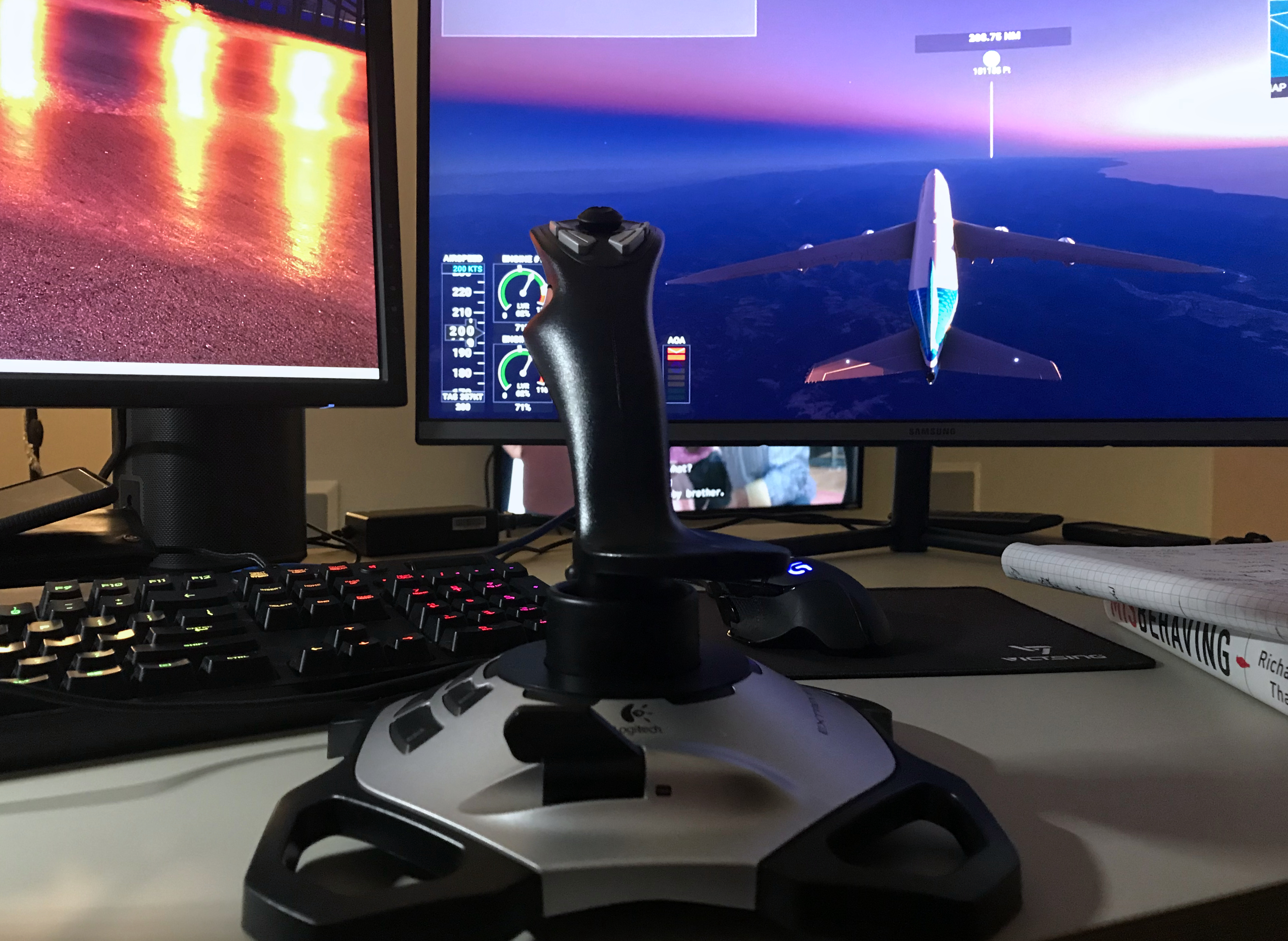 Playing Microsoft Flight Simulator with a joystick attached.