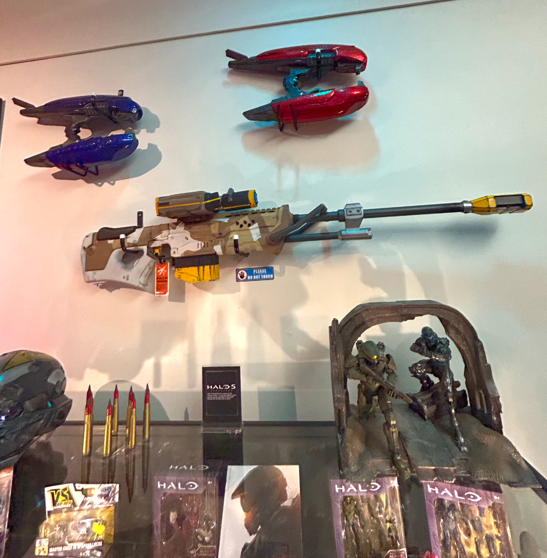 Sniper and plasma rifles on the museum wall