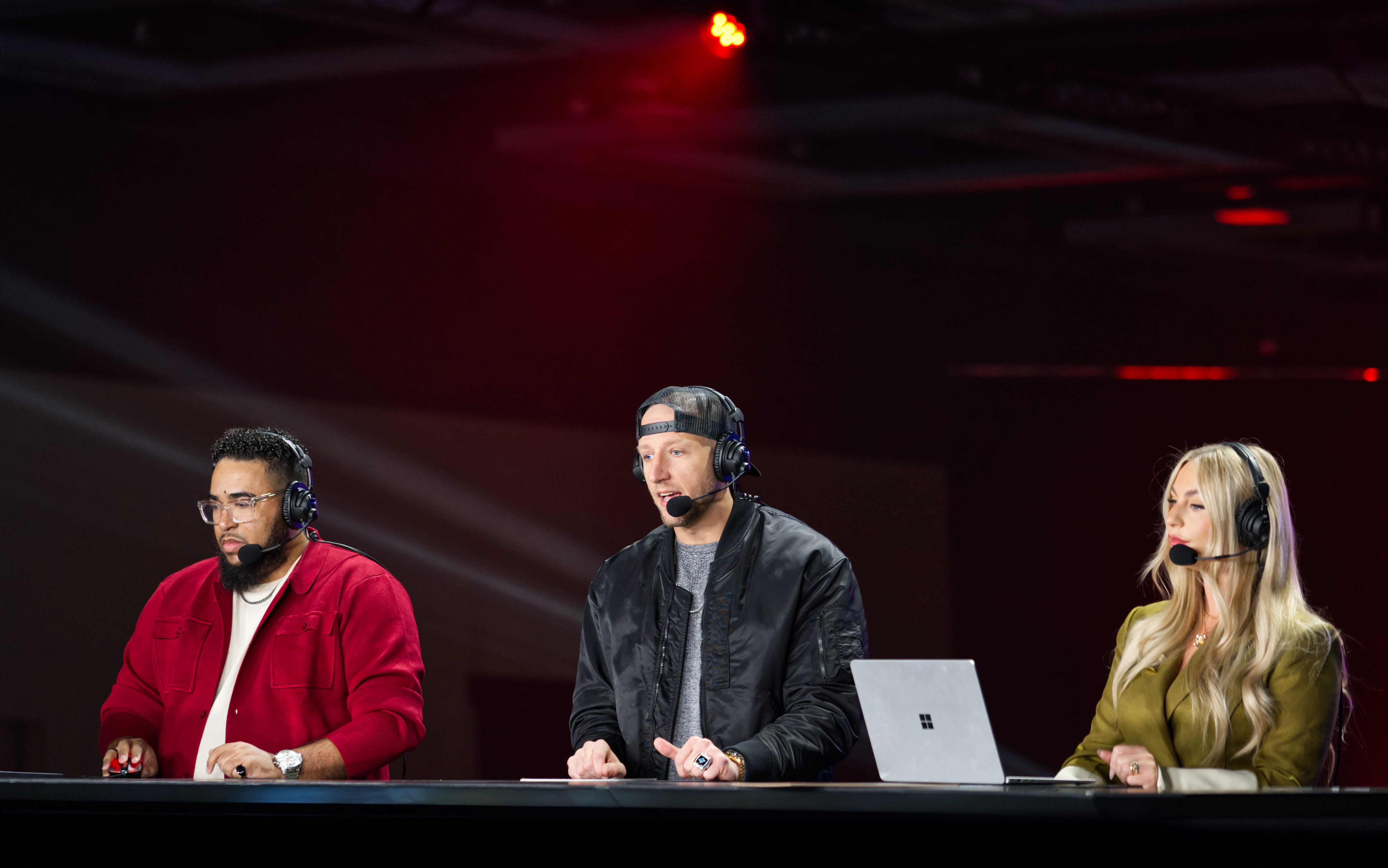 Tony, Clutch, and Lottie providing commentary for ongoing matches.