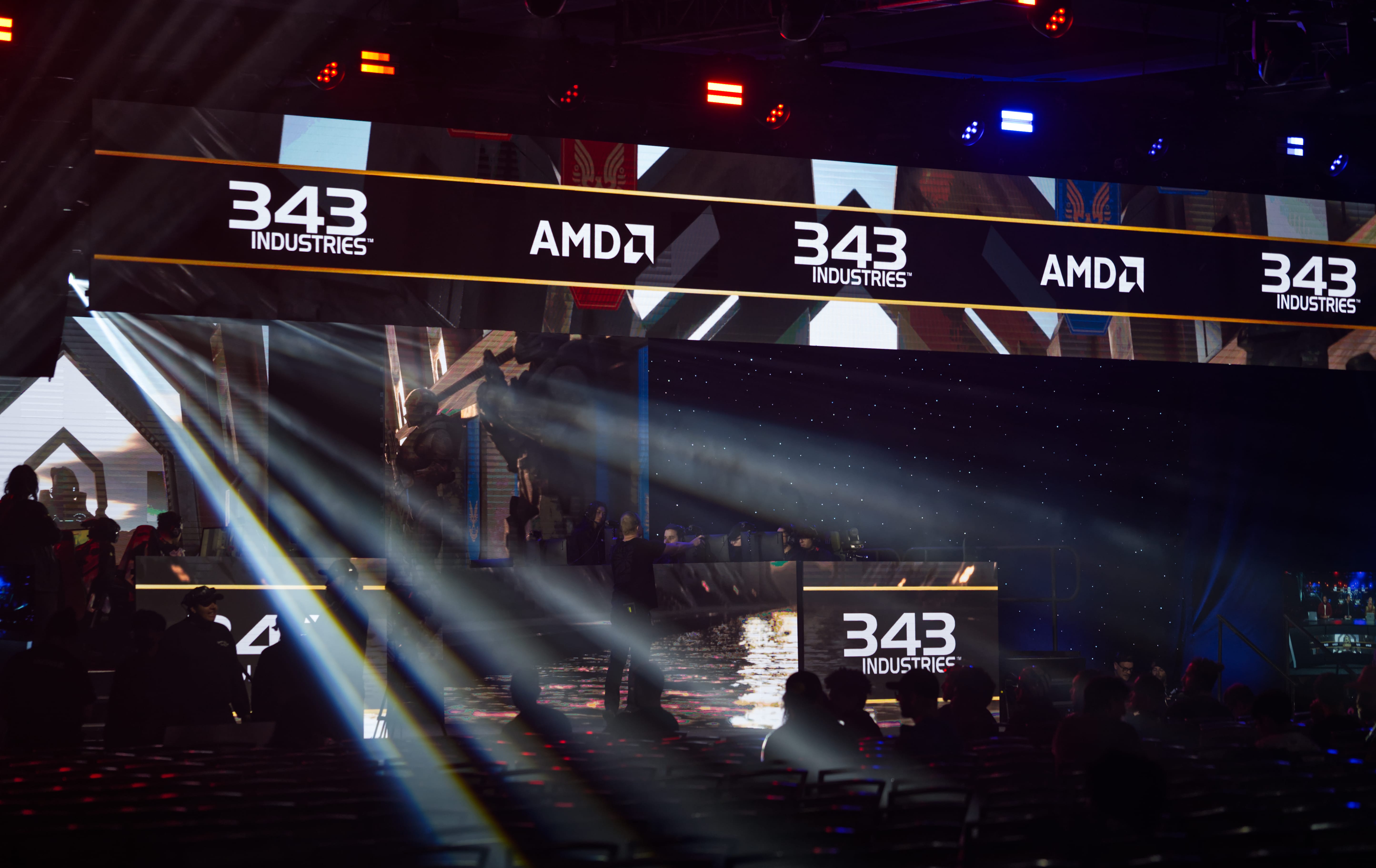 Viewers watching teams prepare on the main stage.