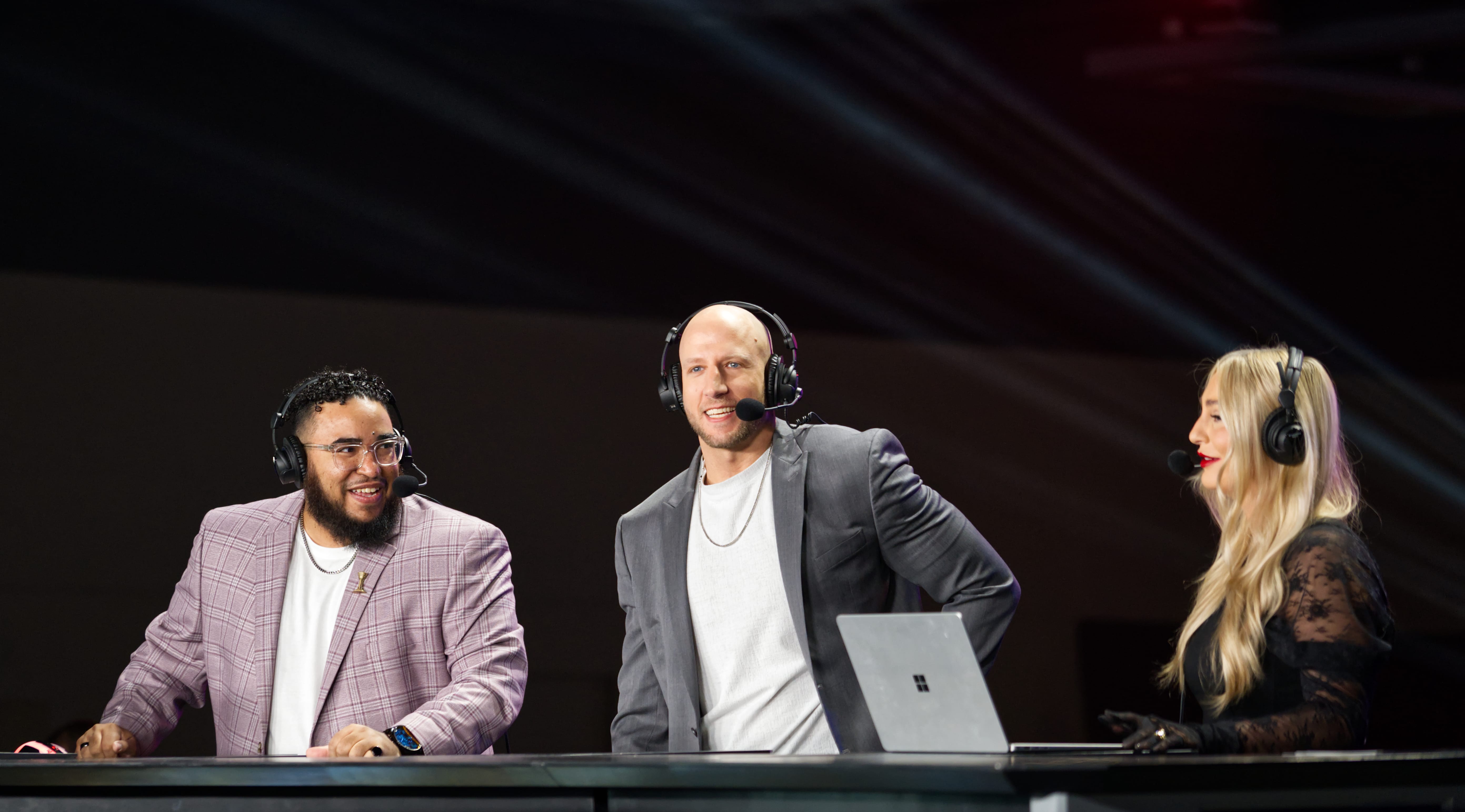 Tony, Clutch, and Lottie providing match commentary.