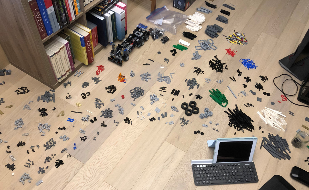 A multitude of LEGO parts on the floor