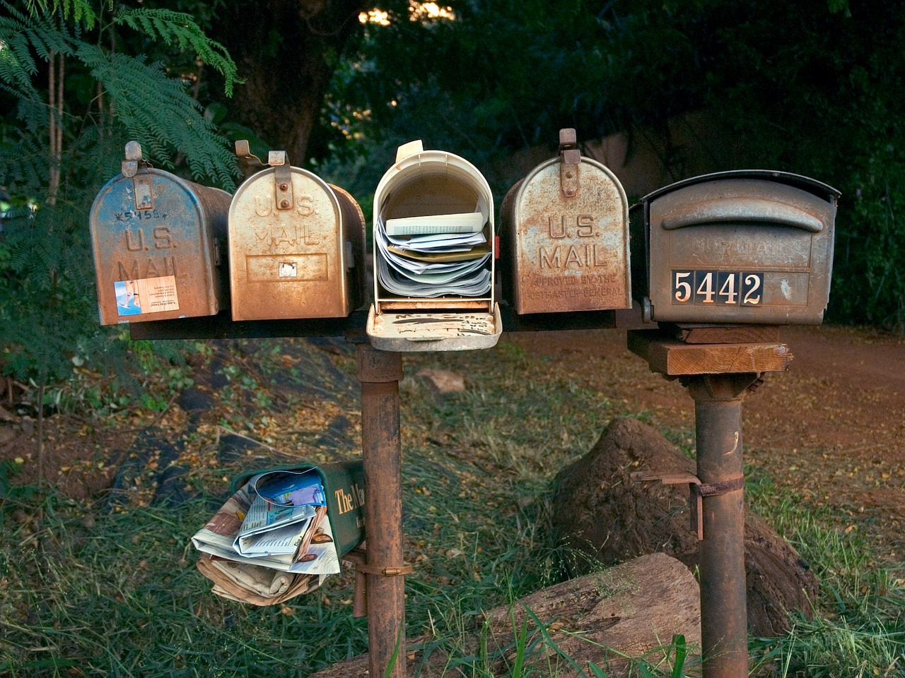 Stacked mailboxes by the side fo the road