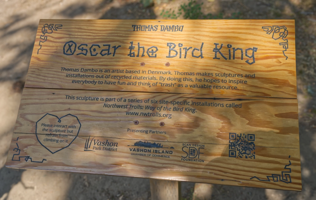 Oscar the Bird King description plate near the troll.