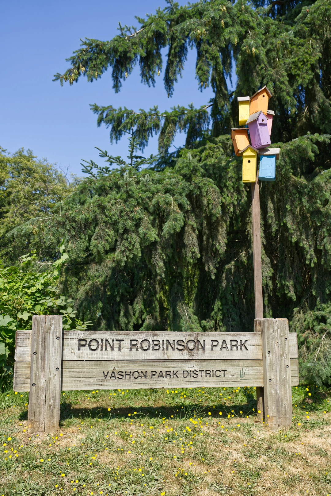 Birdhouses at the entrance to the Point Robinson Park on Vashon Island.